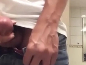 Solo boy enjoys jerking off on the toilet and finishing up with a huge cumshot.