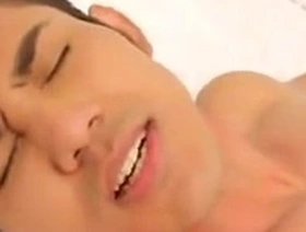 Four hot Asian men in sexual action.
