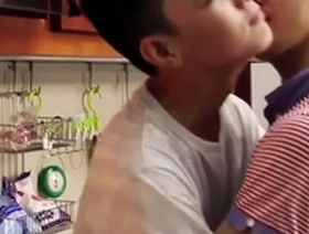 Young Asian boy’s first kiss with another gay man
