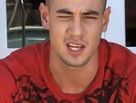 Young gay hunk enjoys outdoor massage and handjob from another guy