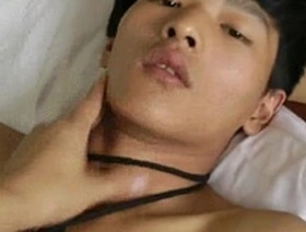 Gay BDSM scene with Asian teens and bigcock boys giving handjobs while they are tied up.