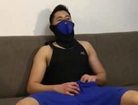 Gay Chinese handsome in mask and action