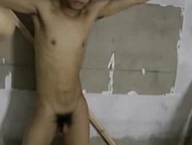 Young Asian men in BDSM roles as spanking slaves.