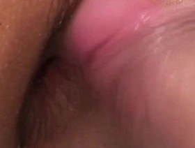 Close up of an Asian twink receiving piss and anal sex