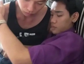 Gay Asian twinks having hot sex on the sofa