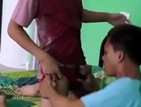 Asian twinks engage in barebacking and pee play with golden shower finale.