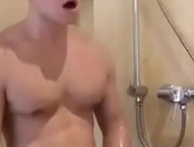 Gay cam video of Asian hunk in shower scene ends with an orgasm