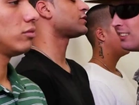 Gay military personnel have sex with their commanding officer and another soldier in the classroom.
