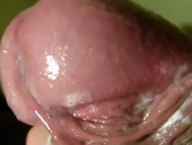 Solo boy’s close up masturbation scene with a red penis glory shot.