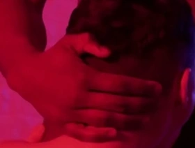 A skinny gay guy gets dominated by a black man in an interracial scene at DarkGodz.com.