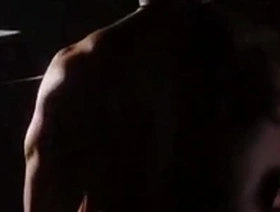 Montys flexing muscles during a gay movie sex scene.