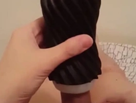 Asian stud gets a satisfying handjob and facial with Tenga Flex