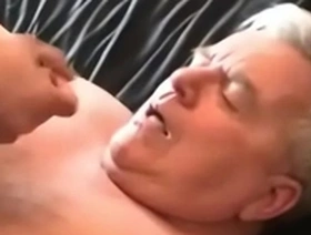 Cum on the face of an Asian young man with an older man.