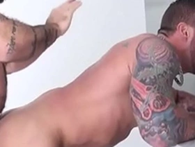 Deepthroated wolf bounces on studs fat cock