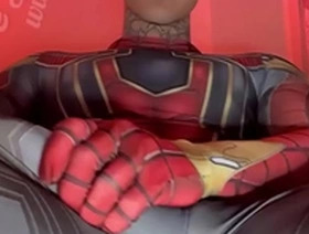 Jakipz strokes his massive cock in super hero costumes before shooting a huge load