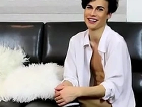 Naughty twink Greco Rai jacks off on the couch all alone
